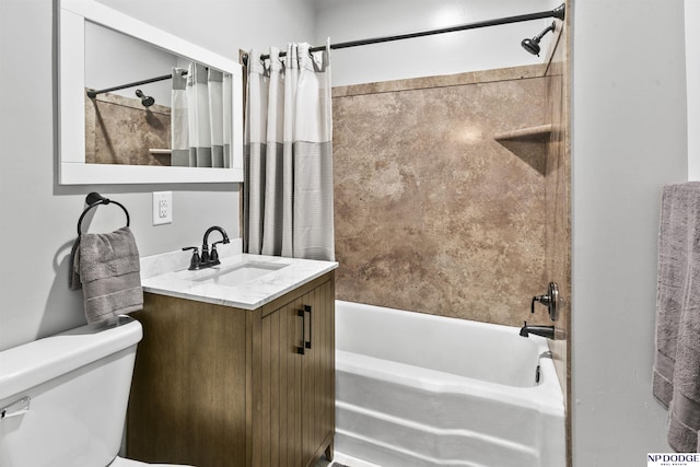 bathroom with vanity, toilet, and shower / tub combo