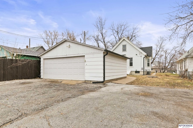 detached garage with fence