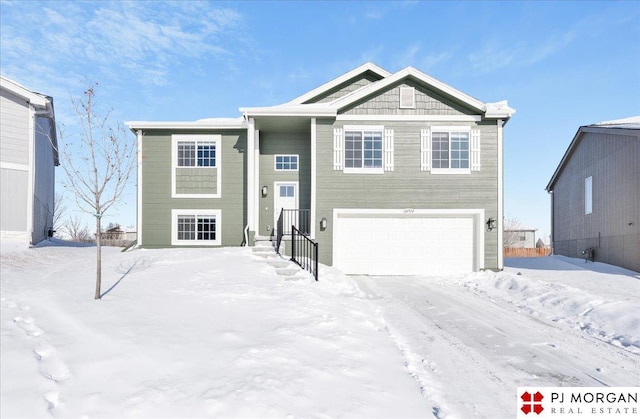 split foyer home featuring a garage