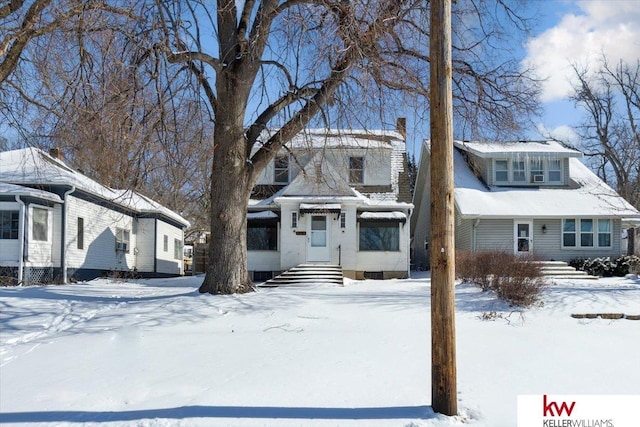 view of front of house with a chimney