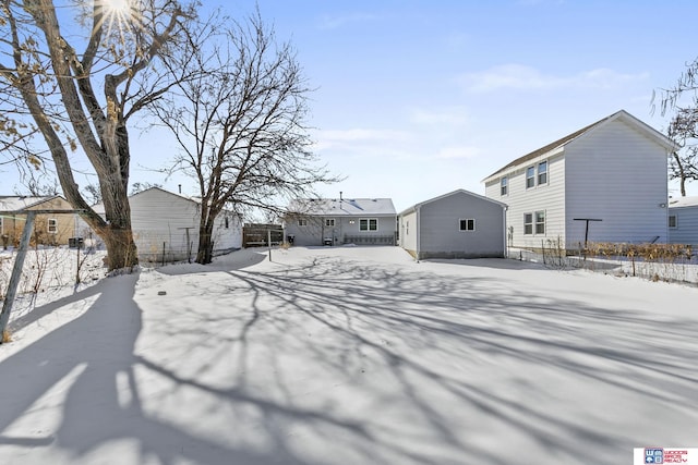 exterior space with a residential view and fence