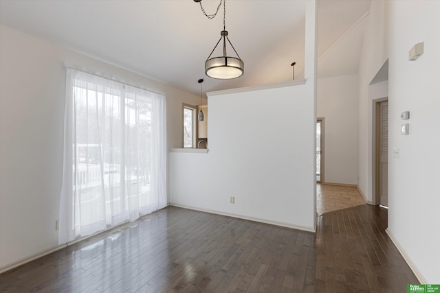 spare room with dark wood-type flooring