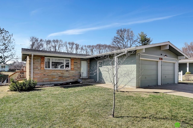 ranch-style house with a front yard, an attached garage, and driveway