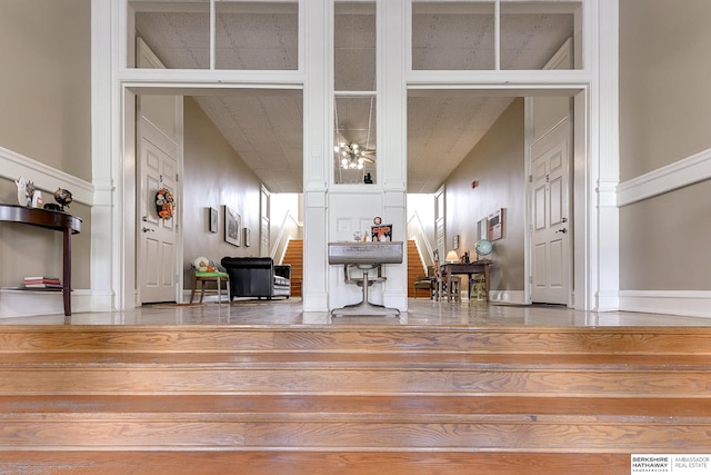 interior space featuring baseboards