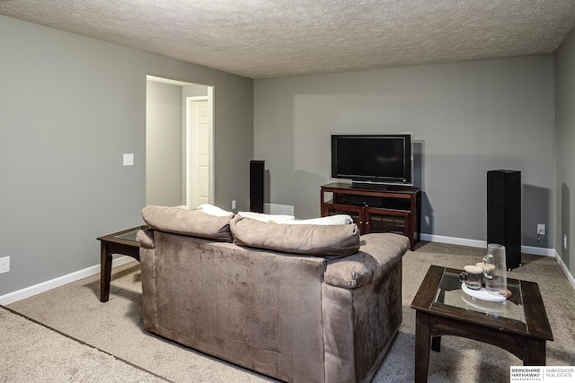 living room featuring a textured ceiling, carpet flooring, visible vents, and baseboards