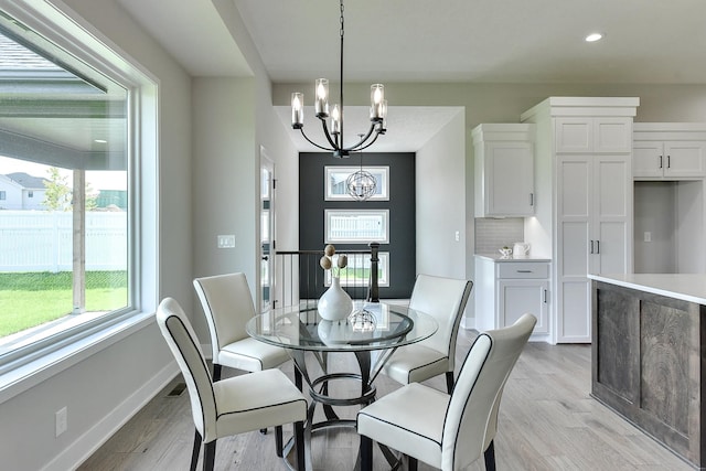 21802 Parkview Dr, Gretna, NE 68028 - dining room featuring a chandelier, light wood-type flooring, and recessed lighting