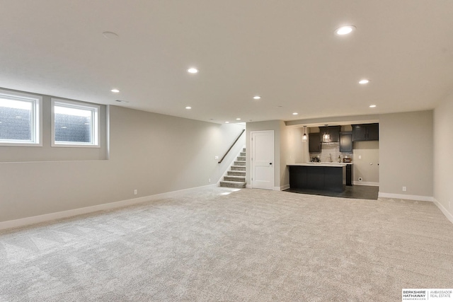 21802 Parkview Dr, Gretna, NE 68028 - basement with recessed lighting, carpet, and stairway