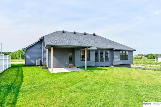 21802 Parkview Dr, Gretna, NE 68028 - rear view of property featuring a patio, a shingled roof, and a lawn