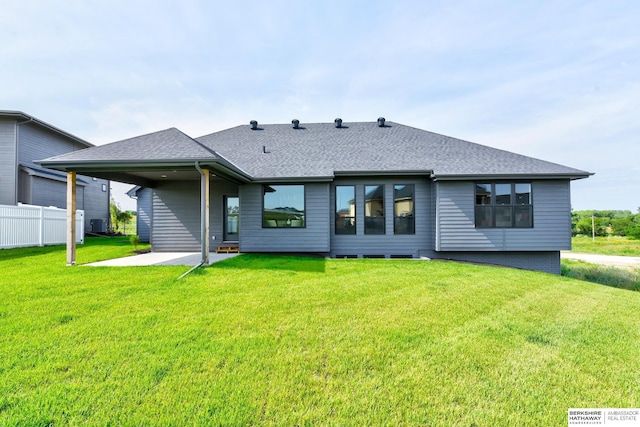 21802 Parkview Dr, Gretna, NE 68028 - back of property featuring a shingled roof and a patio area