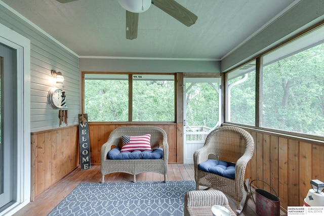 sunroom / solarium with ceiling fan and plenty of natural light