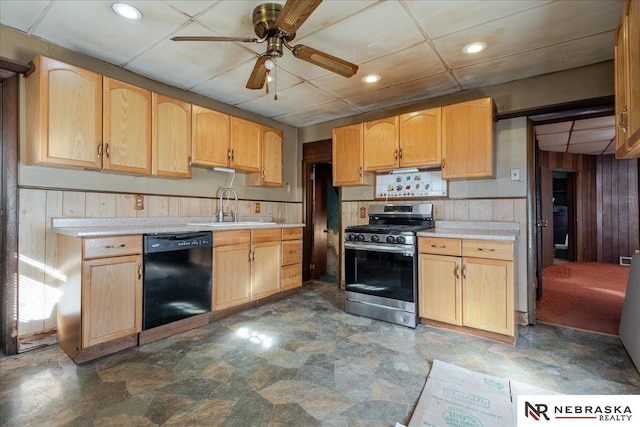 kitchen with black dishwasher, light countertops, and stainless steel gas range oven