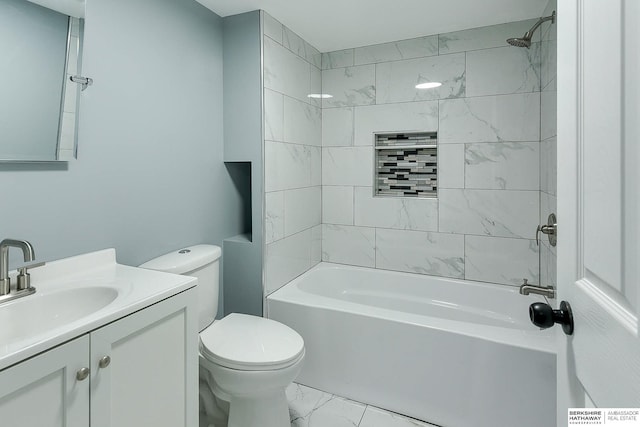 full bathroom featuring  shower combination, marble finish floor, toilet, and vanity