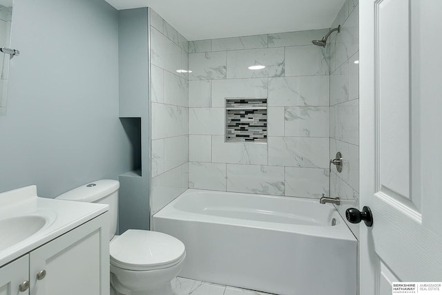 full bath with toilet, marble finish floor, shower / bath combination, and vanity