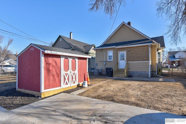 exterior space with entry steps and fence