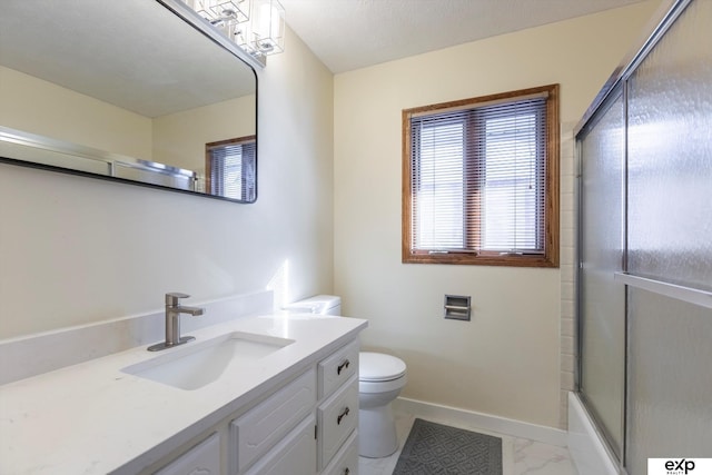 bathroom with toilet, shower / bath combination with glass door, vanity, baseboards, and marble finish floor