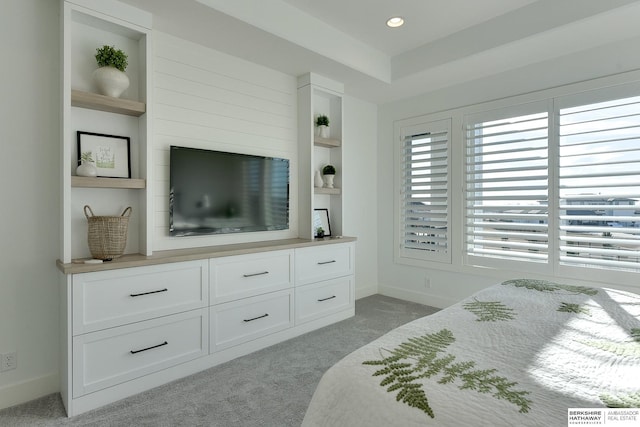 bedroom featuring light carpet, baseboards, and recessed lighting