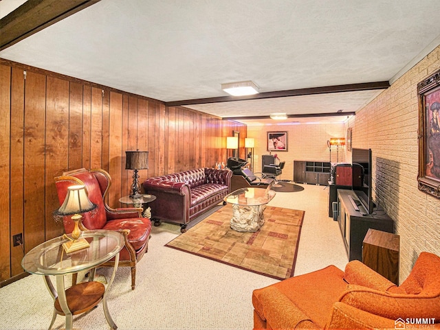 living room with brick wall, wood walls, beamed ceiling, and light colored carpet