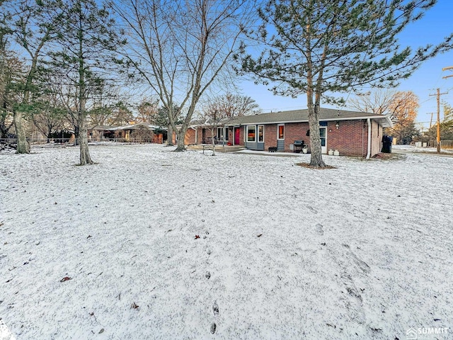 view of front of property with brick siding