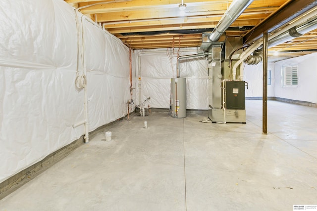 unfinished basement with heating unit and gas water heater