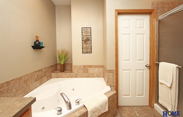 bathroom with a whirlpool tub, an enclosed shower, and vanity