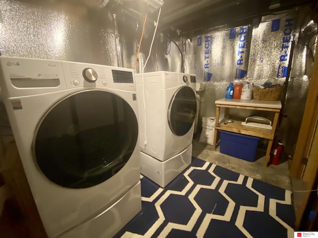 washroom with laundry area and separate washer and dryer