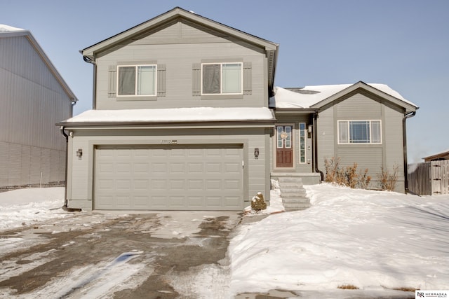 view of front of property featuring a garage