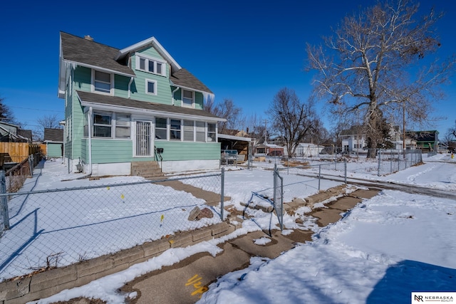 traditional style home with entry steps and fence