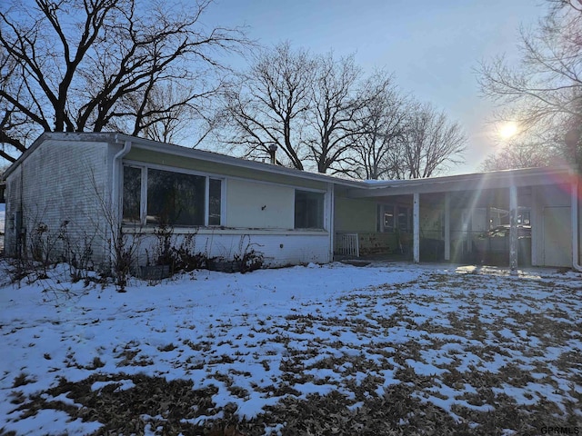 view of front of home with brick siding