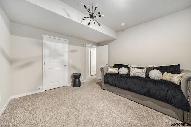 living area featuring baseboards and light colored carpet