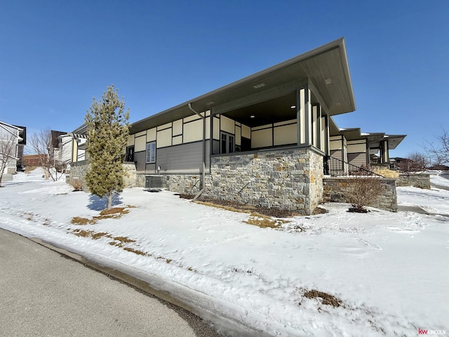 view of front of property featuring stone siding