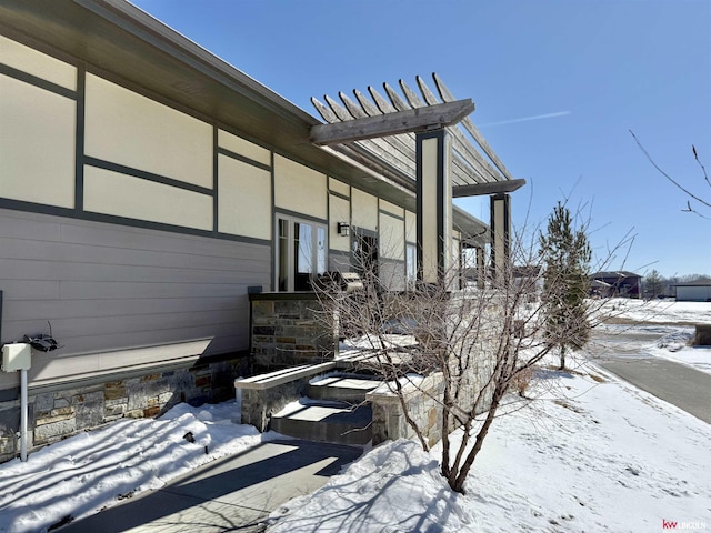 view of snow covered property