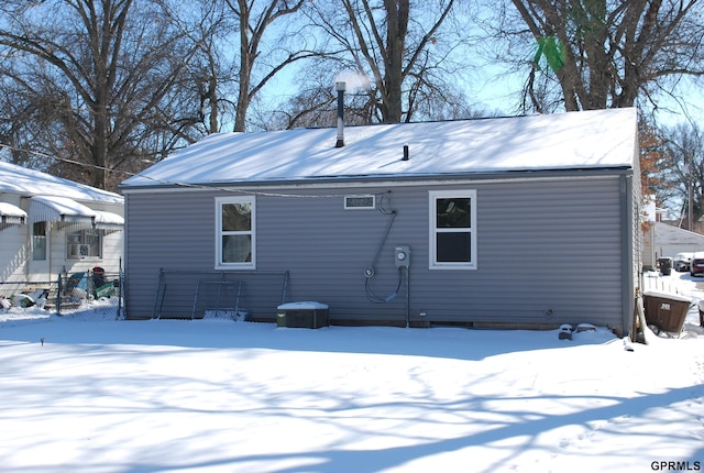 view of snow covered property