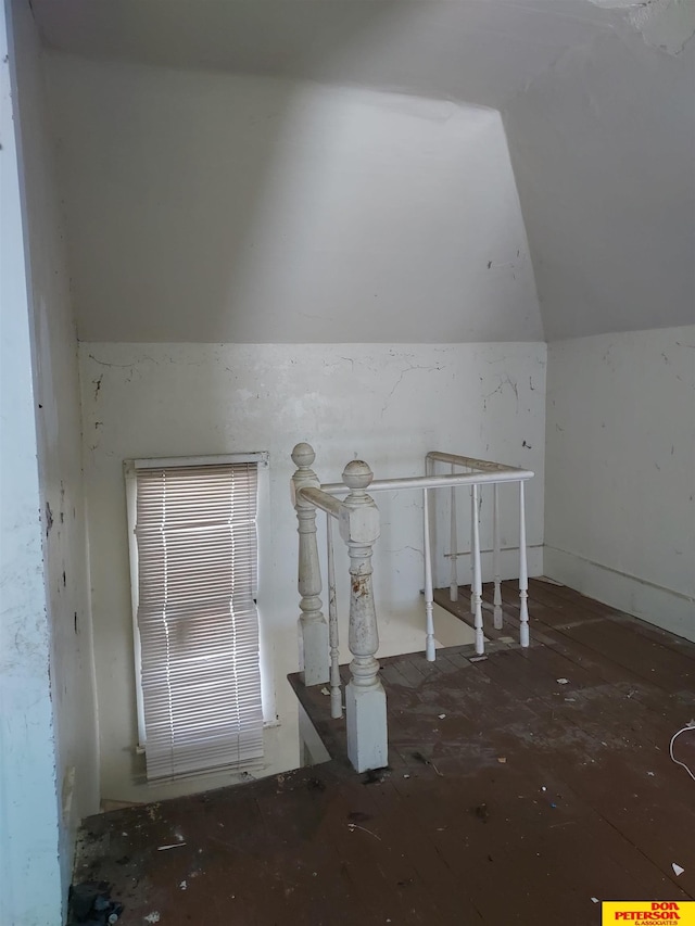 interior space featuring vaulted ceiling