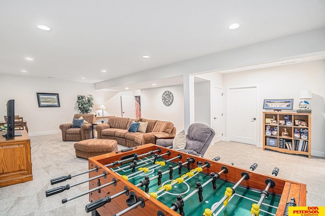 rec room with light carpet, baseboards, and recessed lighting