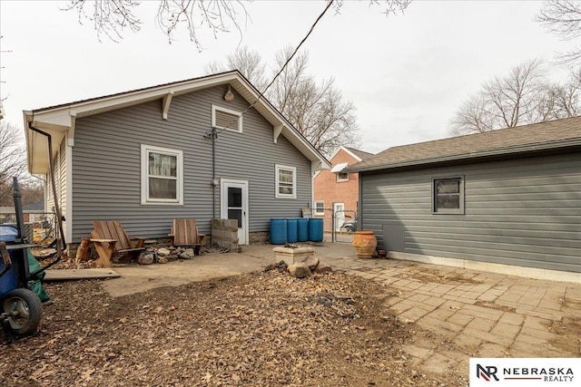 back of property with a patio area