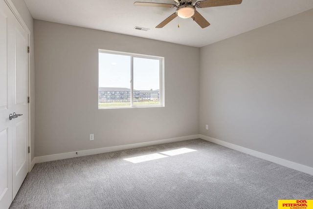 3563 Little Bluestem Rd, Fremont, NE 68025 - unfurnished room with light colored carpet and ceiling fan
