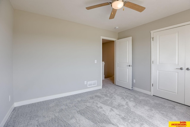 3563 Little Bluestem Rd, Fremont, NE 68025 - unfurnished bedroom with carpet and a ceiling fan