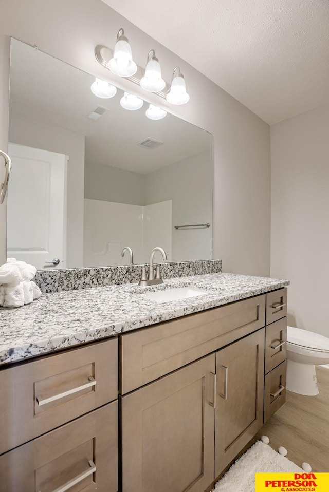 3563 Little Bluestem Rd, Fremont, NE 68025 - full bath featuring wood finished floors and vanity