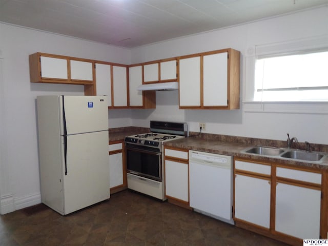 kitchen with under cabinet range hood, white appliances, a sink, and white cabinets