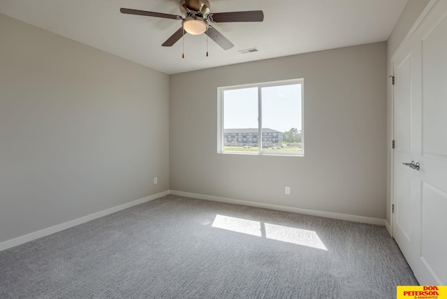 3575 Little Bluestem Rd, Fremont, NE 68025 - carpeted spare room featuring baseboards and a ceiling fan