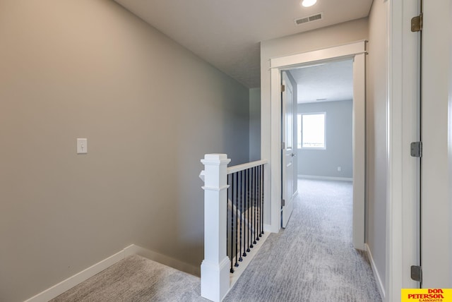 3575 Little Bluestem Rd, Fremont, NE 68025 - hallway featuring an upstairs landing and light colored carpet