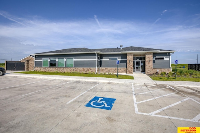 3575 Little Bluestem Rd, Fremont, NE 68025 - view of building exterior with uncovered parking