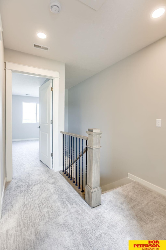 3587 Little Bluestem Rd, Fremont, NE 68025 - corridor featuring an upstairs landing, carpet, and recessed lighting