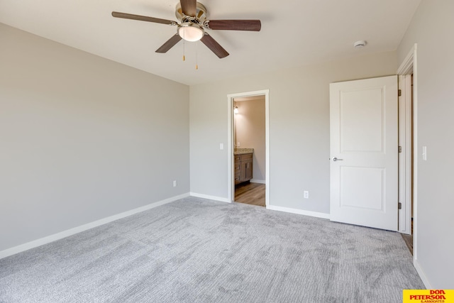 3587 Little Bluestem Rd, Fremont, NE 68025 - unfurnished bedroom featuring carpet floors, a ceiling fan, and connected bathroom