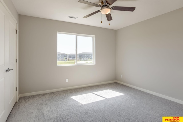 3587 Little Bluestem Rd, Fremont, NE 68025 - unfurnished room with light carpet and ceiling fan