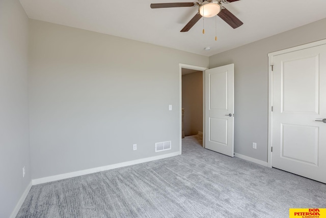 3587 Little Bluestem Rd, Fremont, NE 68025 - unfurnished bedroom featuring carpet and ceiling fan