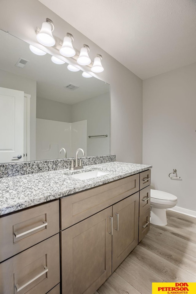 3587 Little Bluestem Rd, Fremont, NE 68025 - bathroom with vanity and wood finished floors