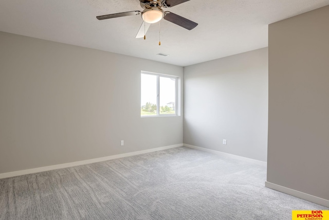 3587 Little Bluestem Rd, Fremont, NE 68025 - unfurnished room with ceiling fan and light colored carpet