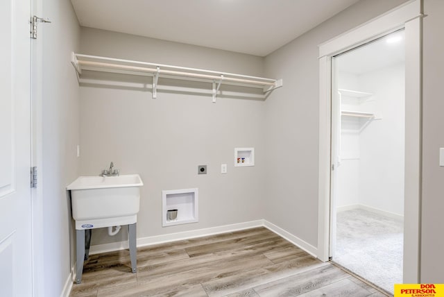 3593 Little Bluestem Rd, Fremont, NE 68025 - washroom with light wood-style flooring, hookup for an electric dryer, and washer hookup