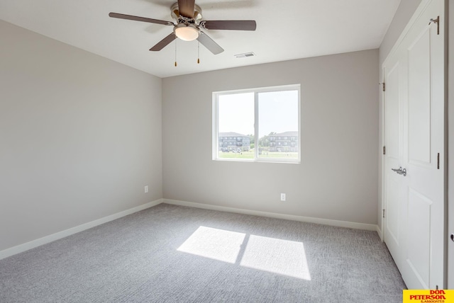 3593 Little Bluestem Rd, Fremont, NE 68025 - unfurnished bedroom featuring carpet flooring, a closet, and a ceiling fan